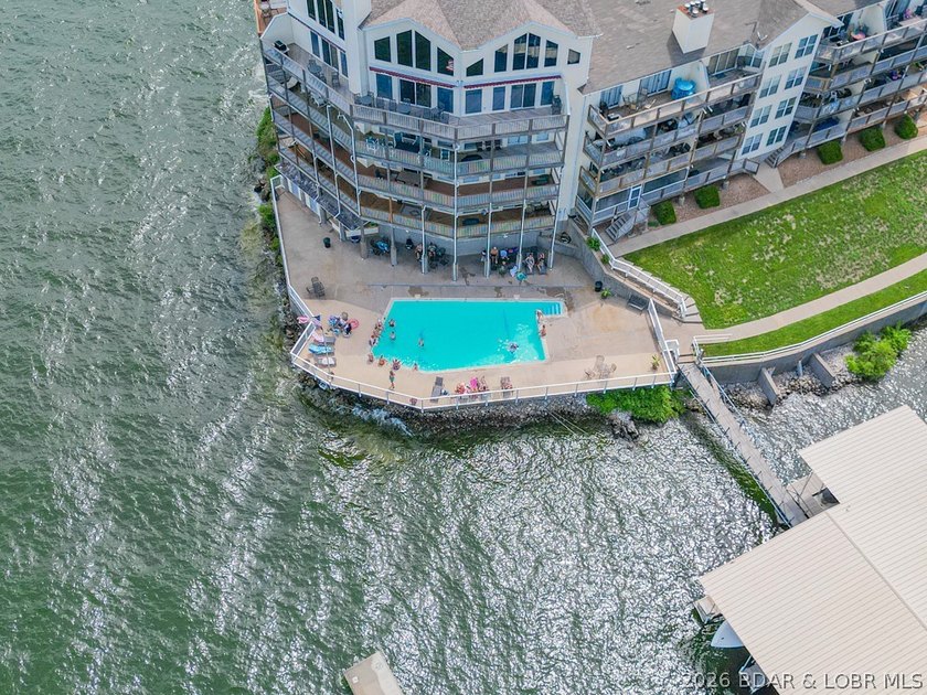 This beautifully updated condo sits high above the lake with - photo 34
