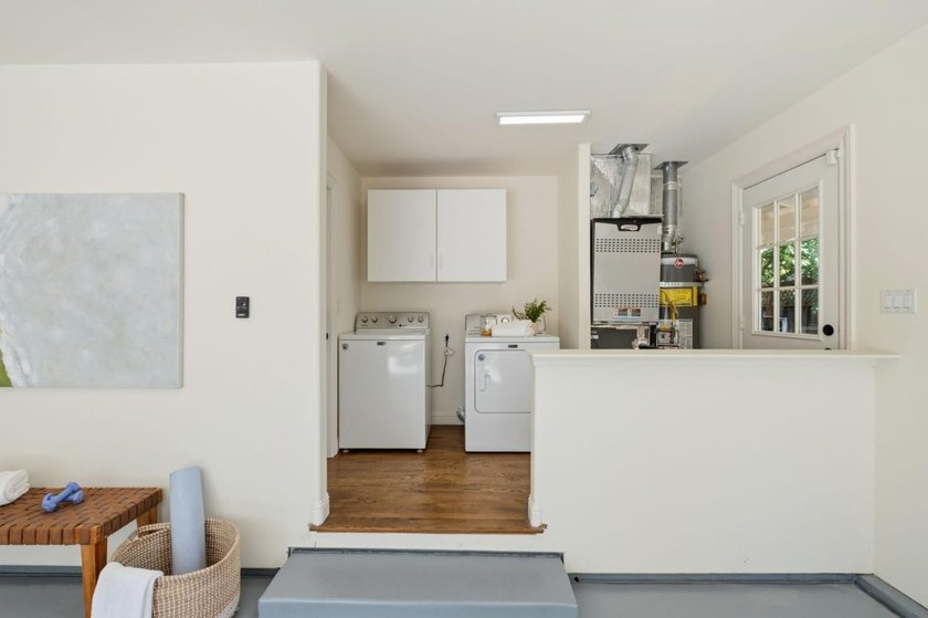 Situated on a picturesque tree-lined street and located down a - photo 34