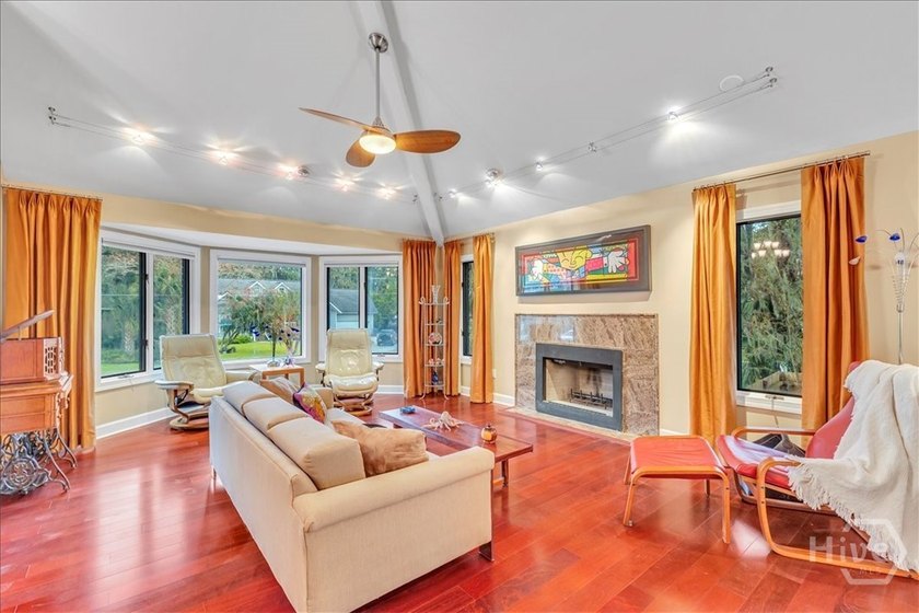 This inviting 5-bedroom, 3-bath all-brick home sits on just - photo 6