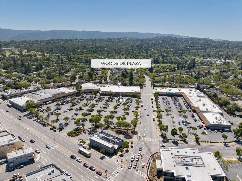 Situated on a picturesque tree-lined street and located down a - photo 40