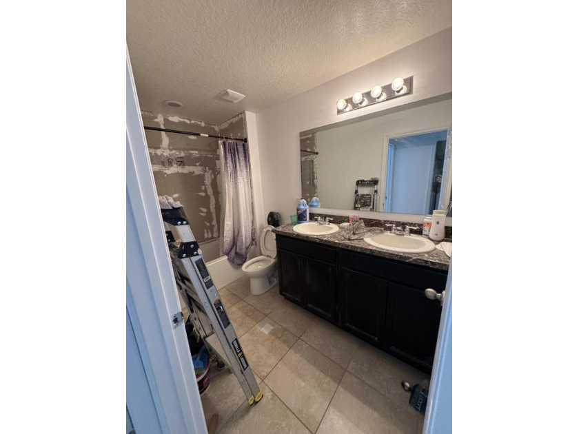THIS IS A SHORT SALE- Check out this 4 BED 2.5 BATH built in - photo 9