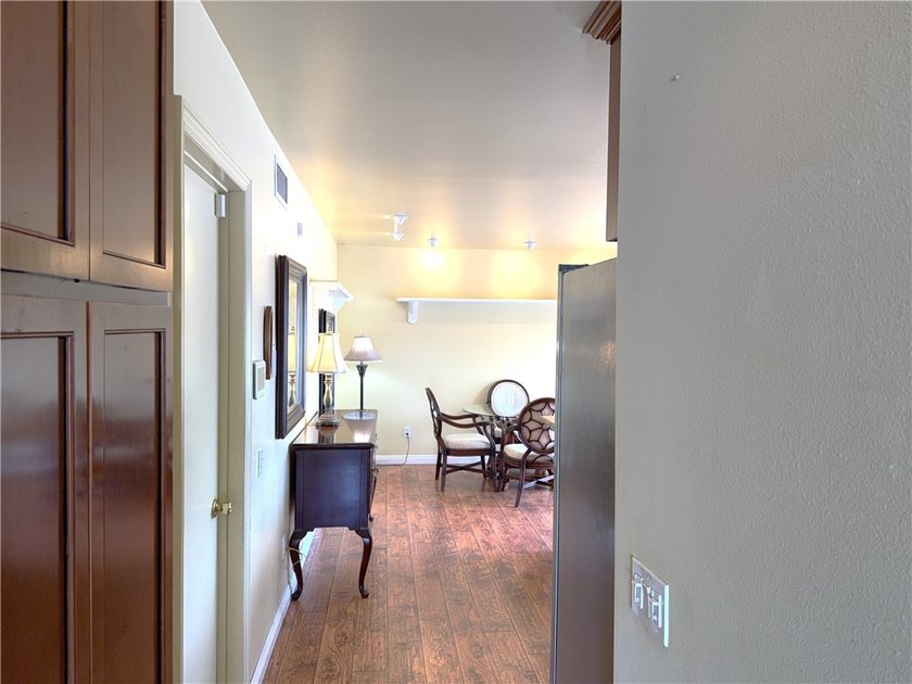 Just one mile from the beach, this immaculate and move-in ready - photo 8