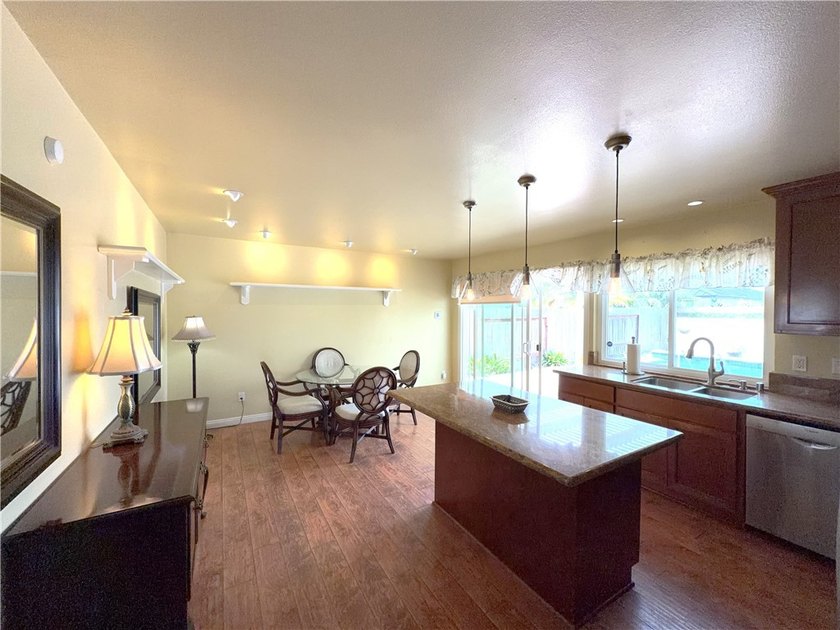 Just one mile from the beach, this immaculate and move-in ready - photo 9