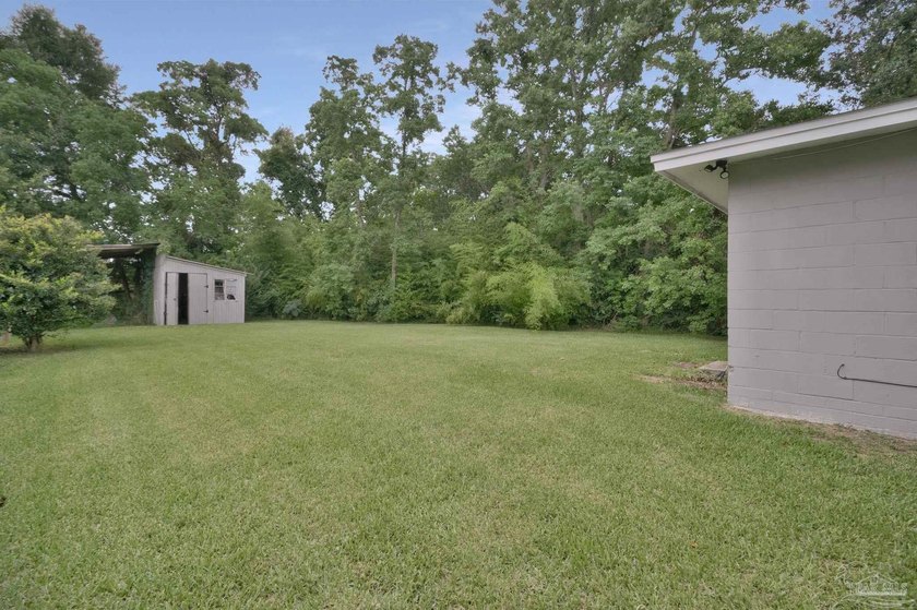 Welcome to this 3-bedroom, 1-bath home featuring a spacious - photo 12