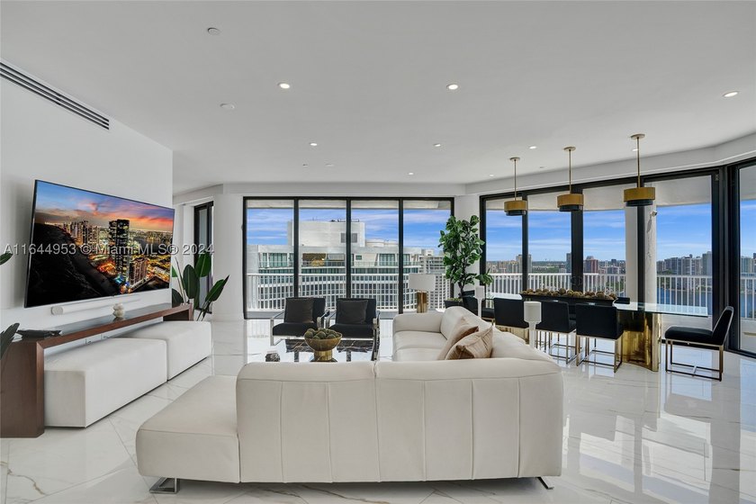 SPECTACULAR, FULLY REMODELED 2 STORY PENTHOUSE HOME OVERLOOKING - photo 3