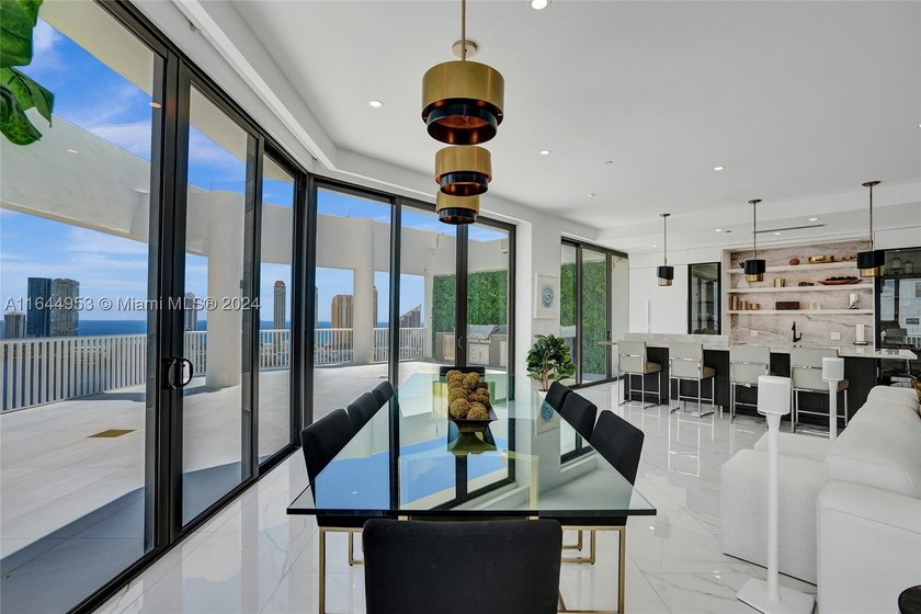 SPECTACULAR, FULLY REMODELED 2 STORY PENTHOUSE HOME OVERLOOKING - photo 4