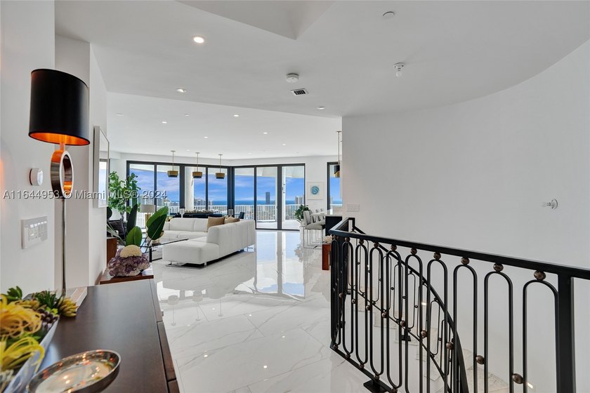 SPECTACULAR, FULLY REMODELED 2 STORY PENTHOUSE HOME OVERLOOKING - photo 7