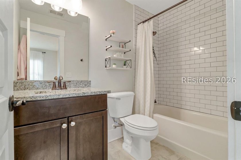 Experience refined Lowcountry living in this luxury semi-custom - photo 24