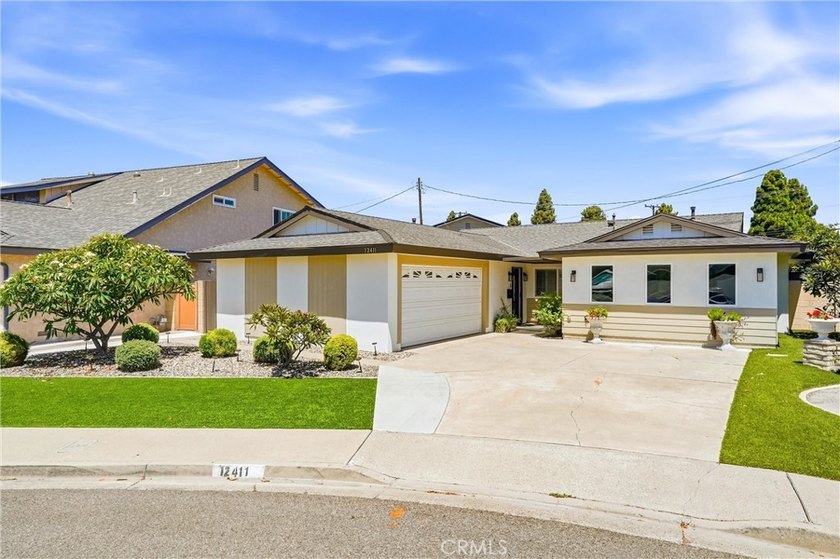 Welcome to 12411 Saint Mark Street, a recently remodeled Garden - photo 2