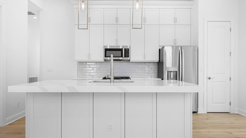 Move in Ready-New Construction by Kolter Homes. This 2-bedroom - photo 2