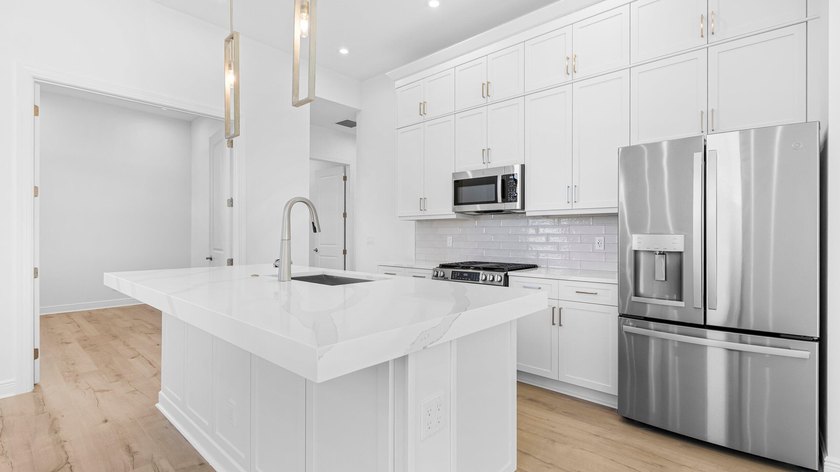 Move in Ready-New Construction by Kolter Homes. This 2-bedroom - photo 3