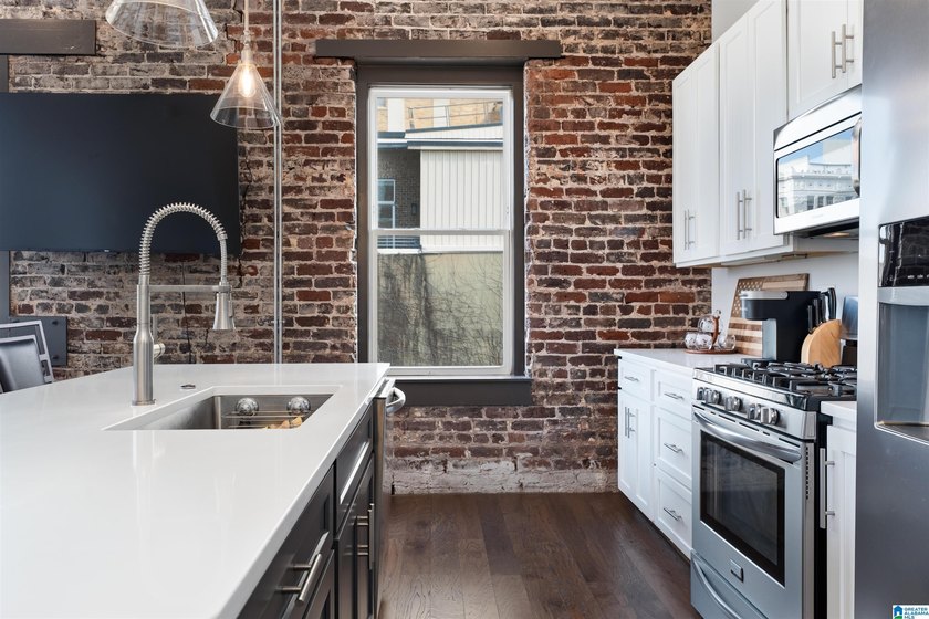 We believe this is the best condo in historic Founders Station! - photo 4