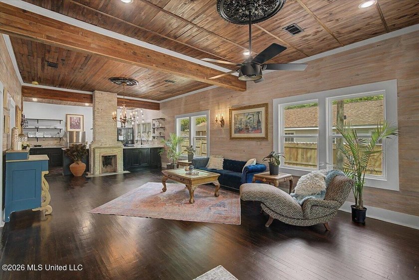 This beautifully renovated home combines modern luxury with - photo 2