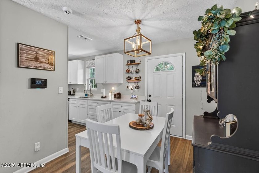 Welcome home to this charming brick beauty nestled on an - photo 12