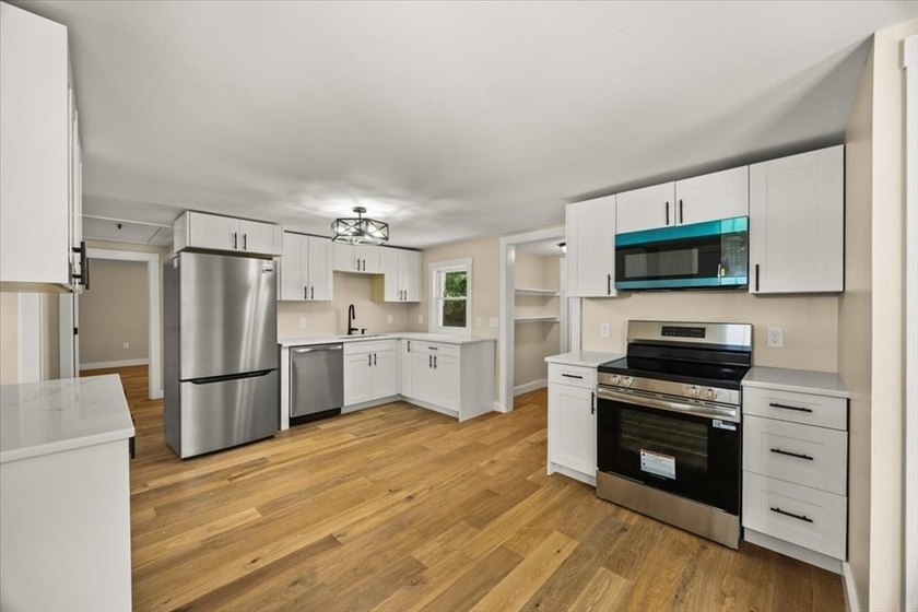 Fully renovated and move-in ready, this charming 2-bedroom home - photo 2