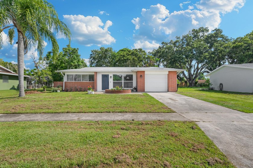 Modernized, Move-In Ready Gem on a Huge Quarter-Acre Lot! - photo 2