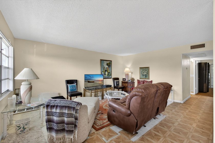Serene lake views from the balcony highlight this 2/2 floor plan - photo 11
