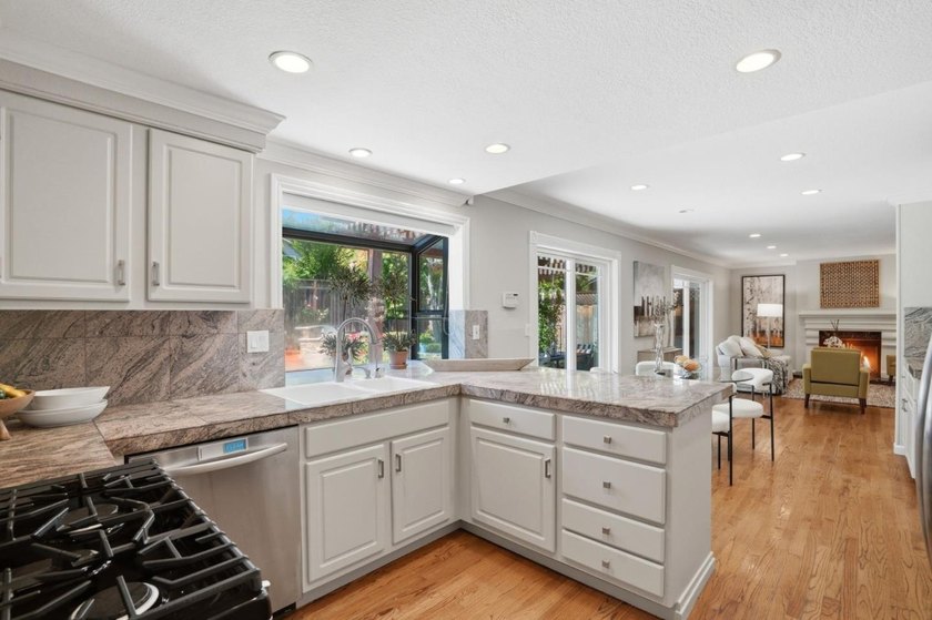 PRIZED CORNER LOT WITH STUNNING REMODEL IN SERENE ALMADEN | - photo 12