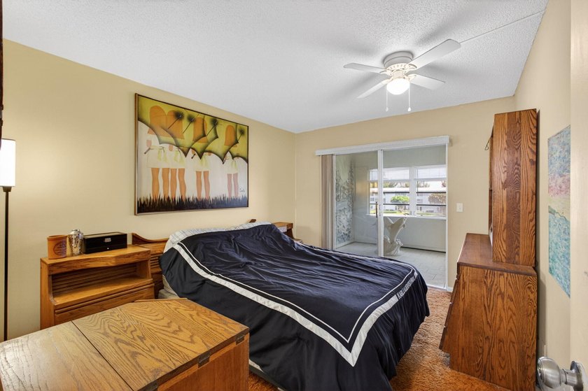 Serene lake views from the balcony highlight this 2/2 floor plan - photo 16