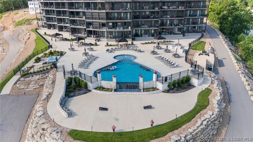 UPSCALE LAKEFRONT CONDO! Discover style with this 2023-built - photo 15