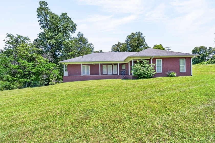 Step inside this beautiful all-brick home featuring 4 spacious - photo 8