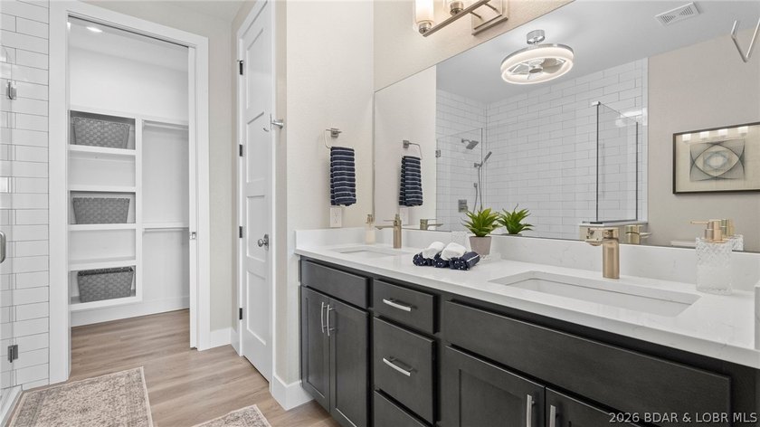 UPSCALE LAKEFRONT CONDO! Discover style with this 2023-built - photo 20