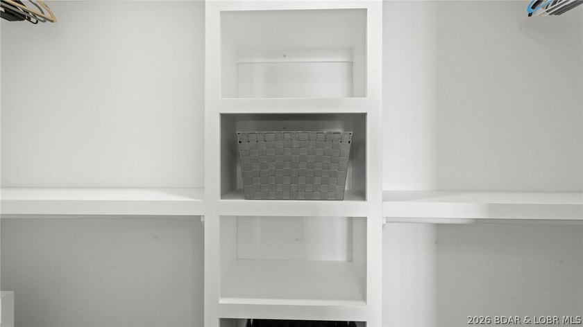 UPSCALE LAKEFRONT CONDO! Discover style with this 2023-built - photo 22