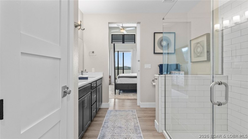 UPSCALE LAKEFRONT CONDO! Discover style with this 2023-built - photo 24