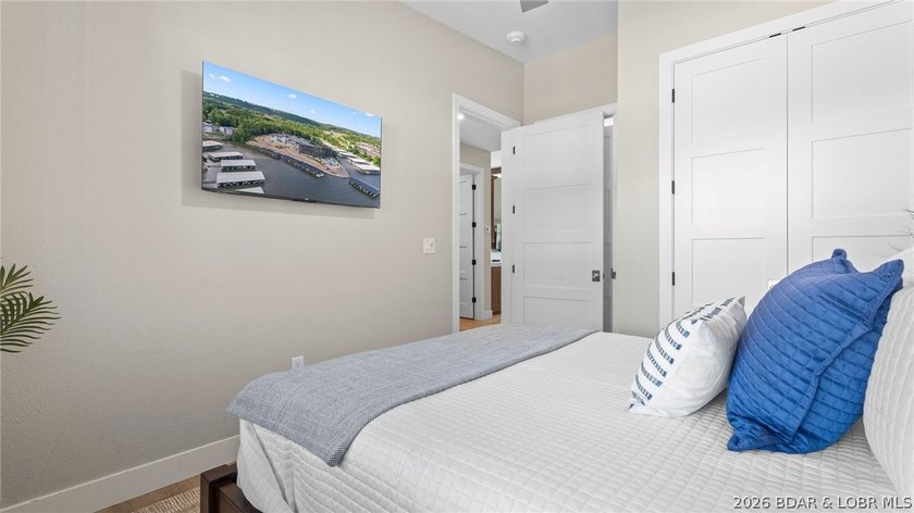 UPSCALE LAKEFRONT CONDO! Discover style with this 2023-built - photo 31