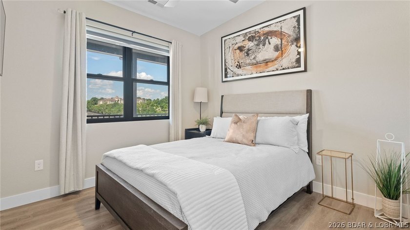 UPSCALE LAKEFRONT CONDO! Discover style with this 2023-built - photo 32