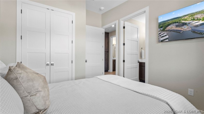 UPSCALE LAKEFRONT CONDO! Discover style with this 2023-built - photo 34