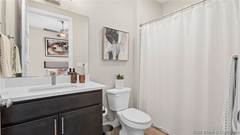 UPSCALE LAKEFRONT CONDO! Discover style with this 2023-built - photo 35