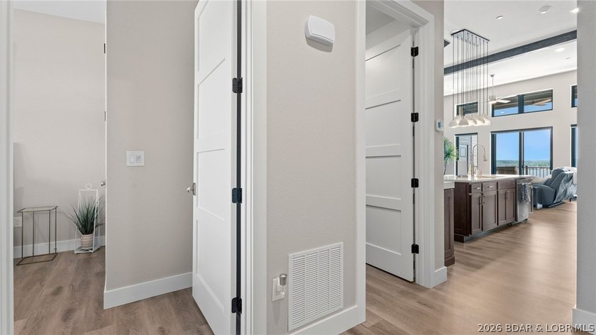 UPSCALE LAKEFRONT CONDO! Discover style with this 2023-built - photo 36