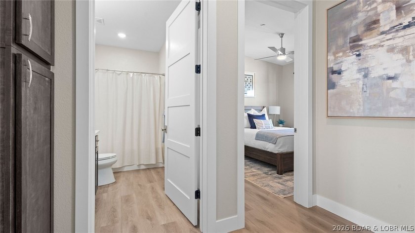 UPSCALE LAKEFRONT CONDO! Discover style with this 2023-built - photo 38