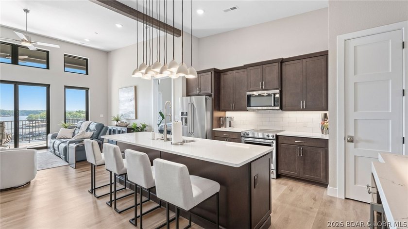 UPSCALE LAKEFRONT CONDO! Discover style with this 2023-built - photo 48