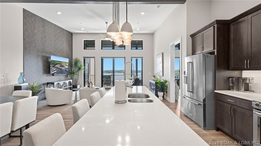 UPSCALE LAKEFRONT CONDO! Discover style with this 2023-built - photo 49