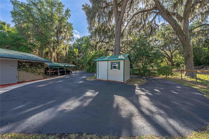 Tucked away on beautiful Lake Weir, this charming gated - photo 50