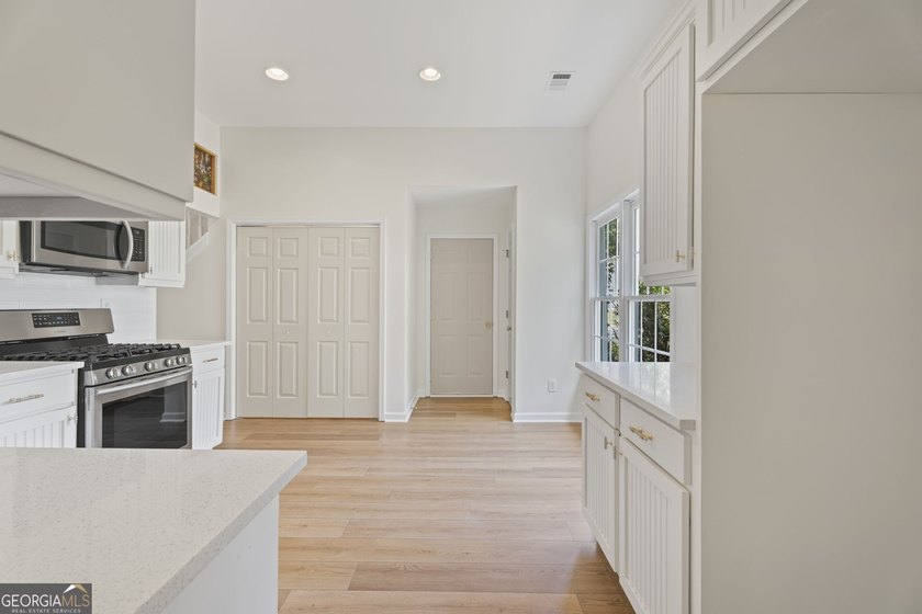 Primary Suite on Main Level | Gorgeous Sunroom Welcome to 1011 - photo 16