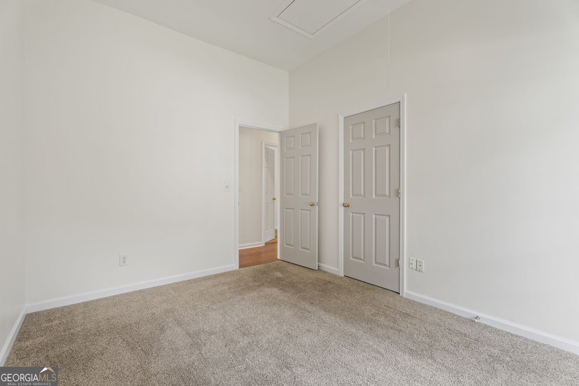 Primary Suite on Main Level | Gorgeous Sunroom Welcome to 1011 - photo 23