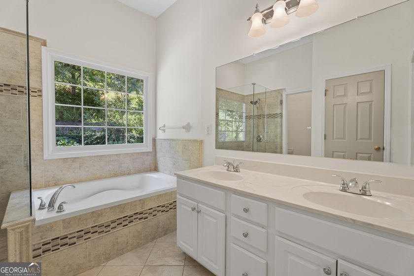 Primary Suite on Main Level | Gorgeous Sunroom Welcome to 1011 - photo 29