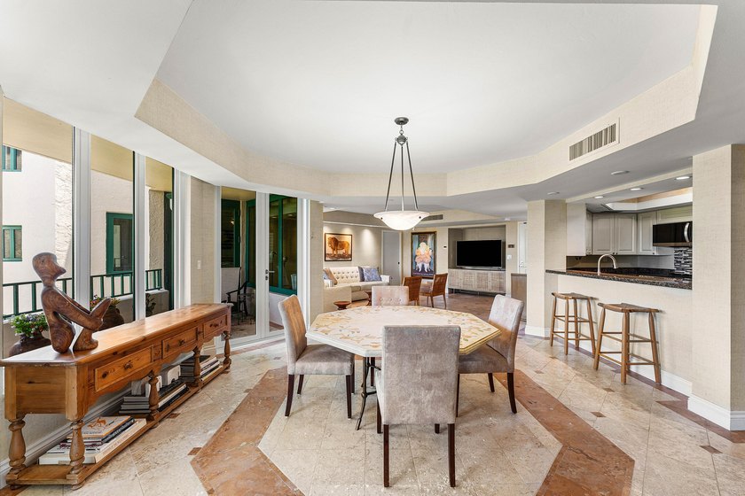 Welcome to the exclusive waterfront community of Mizner Court in - photo 11