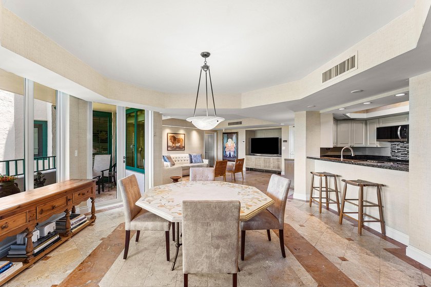 Welcome to the exclusive waterfront community of Mizner Court in - photo 12