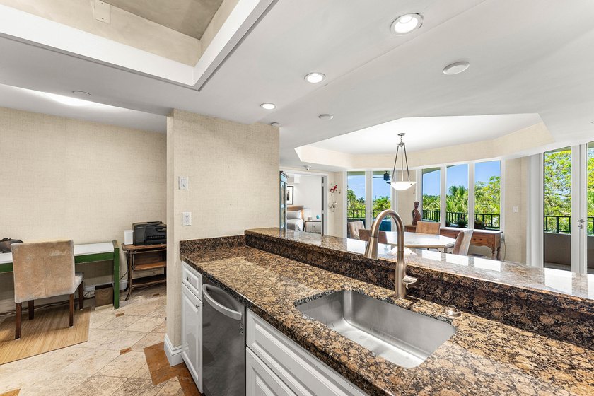 Welcome to the exclusive waterfront community of Mizner Court in - photo 16