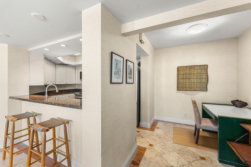 Welcome to the exclusive waterfront community of Mizner Court in - photo 18