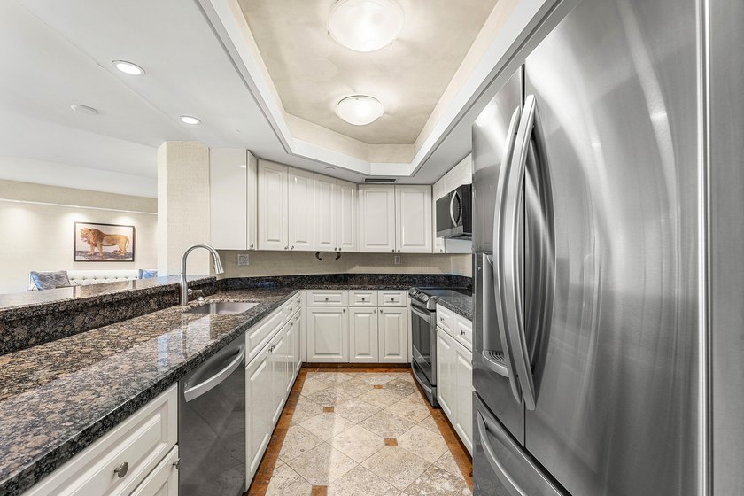 Welcome to the exclusive waterfront community of Mizner Court in - photo 20
