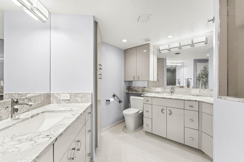 Welcome to the exclusive waterfront community of Mizner Court in - photo 28