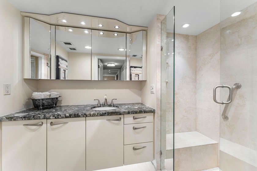 Welcome to the exclusive waterfront community of Mizner Court in - photo 34
