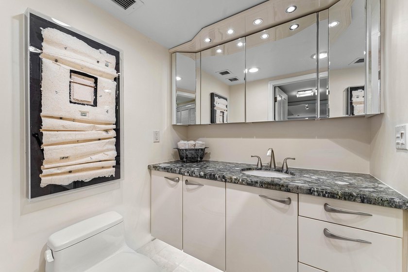 Welcome to the exclusive waterfront community of Mizner Court in - photo 35