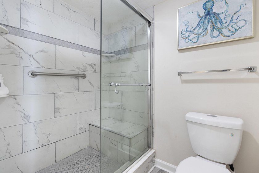 Ideally located at Pelican Beach Resort, this coastal condo - photo 18