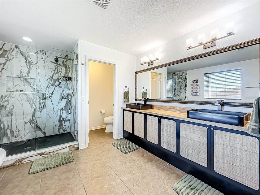 Discover over 3,200 sq.ft. of private living in the highly - photo 35